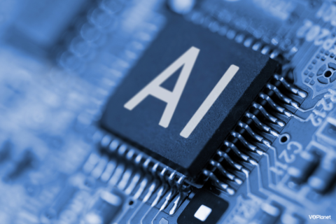 The Hidden Cost of AI Voiceovers: Why Human Voices Still Win A computer circuit board with square black chip with letters AI stamped in white