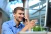 Six ways to Direct a Voice Over Man directing a voice over on phone pointing at computer screen